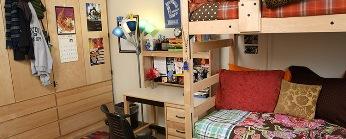 dorm room decorated with personal belongings